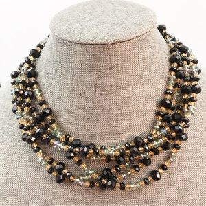 Austrian Crystal Necklace. In colours of black, blue and gold faceted beads.
